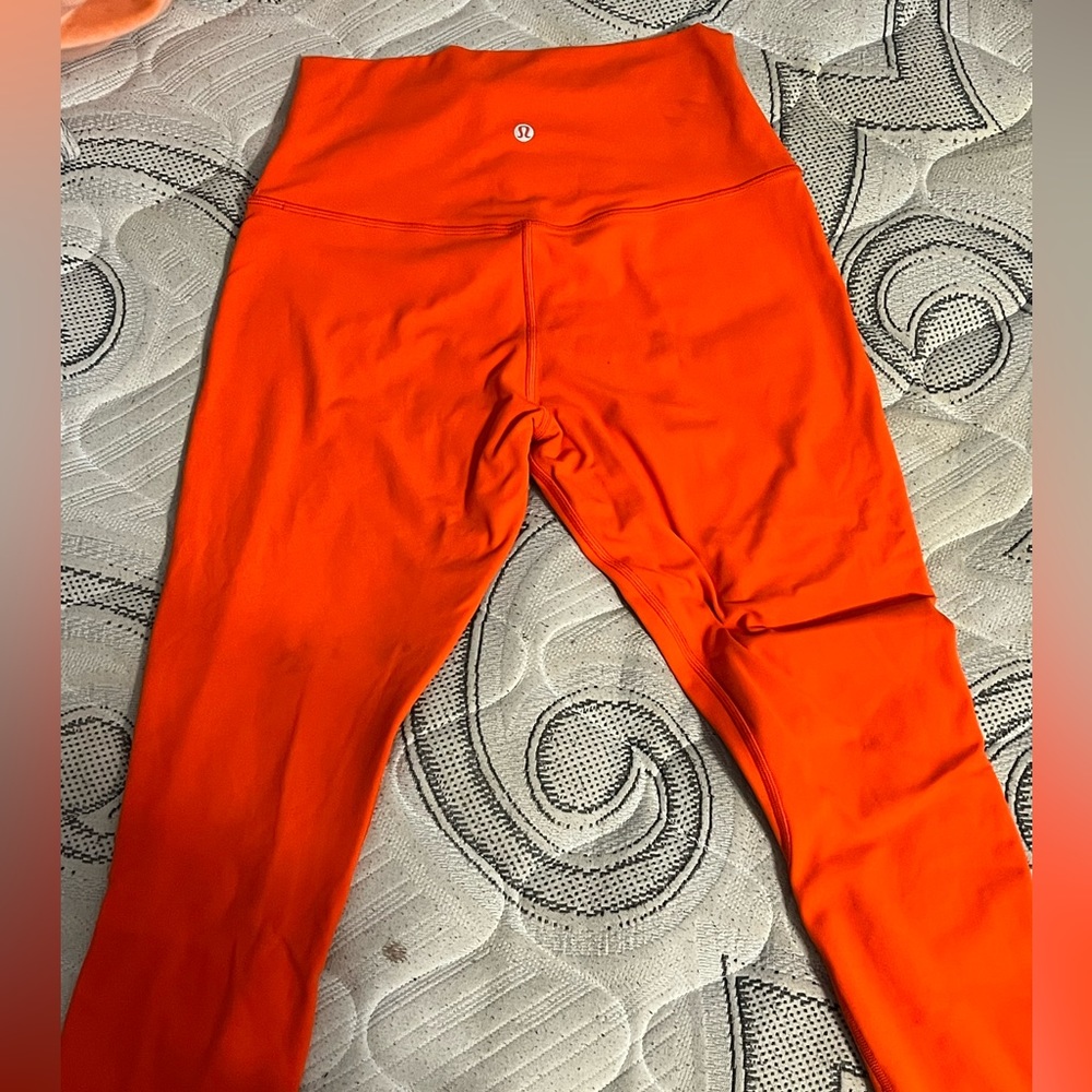 Orange lulu lemon leggings size 8